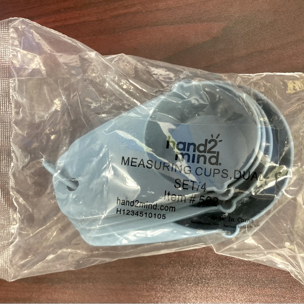 Hand2Mind measuring cups set of 4. New in package.